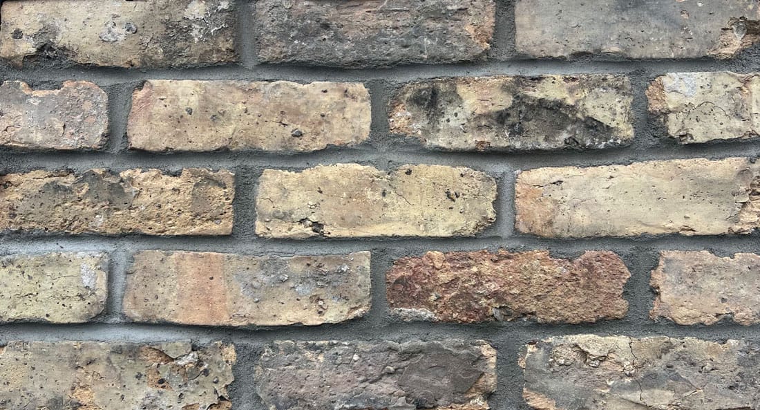 Antique Buff Chicago thin brick veneer mockup with mortar